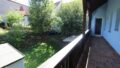 Blick vom Balkon in den Garten